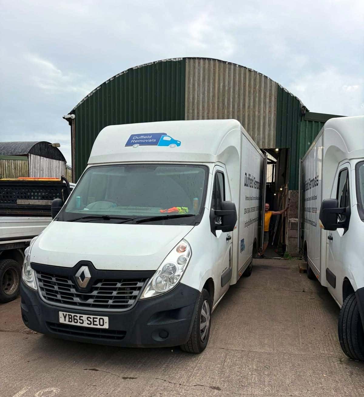 Duffield van in front of the green arched barn at the Chester workshop