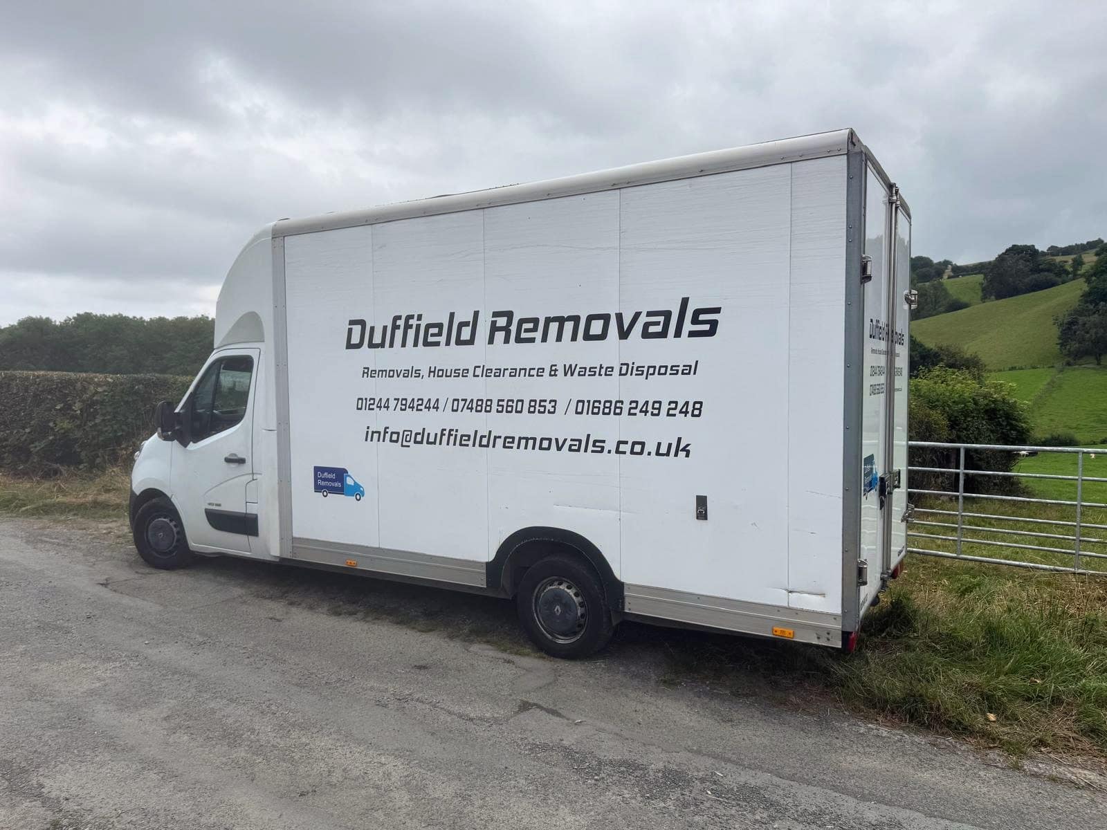 Full side livery of a Duffield Removals Luton van with phone numbers and email